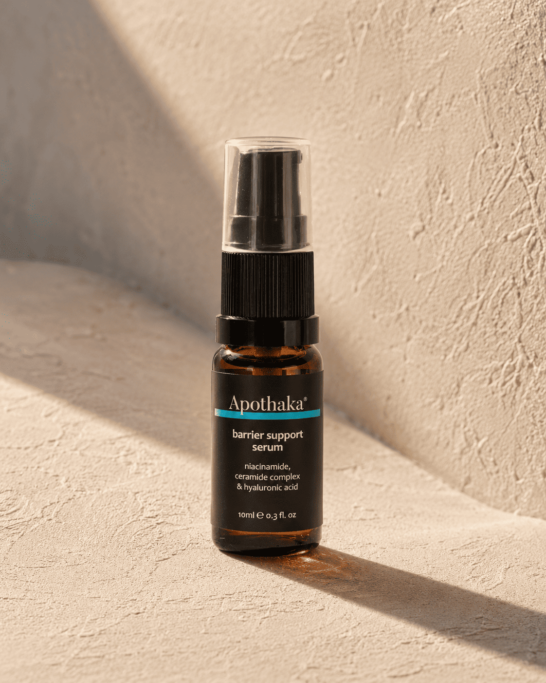Apothaka barrier support serum — AI product photography in warm natural light